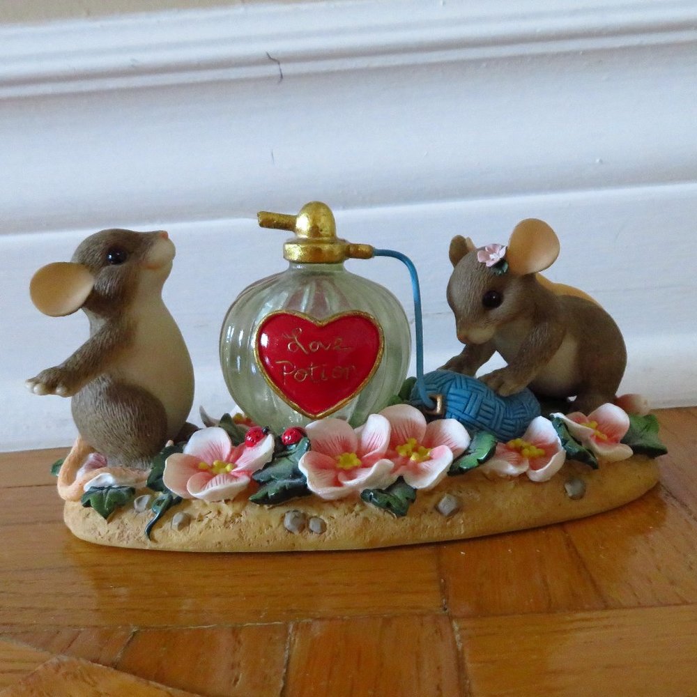 These are charming tails mice made by Fitz Floyd.